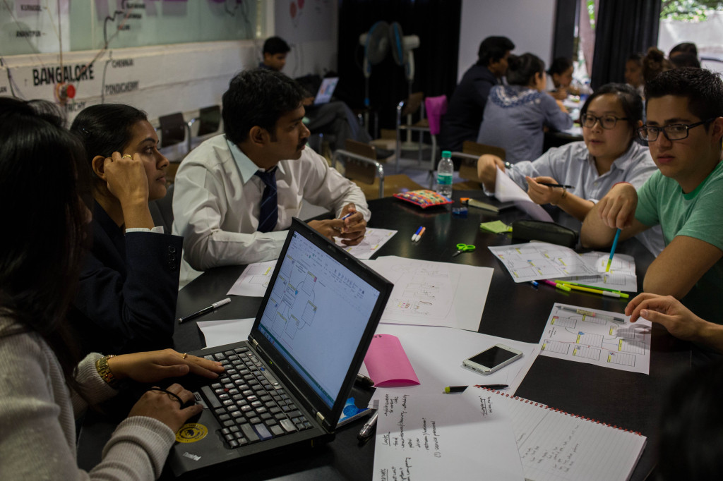 Students exchange insights on business model innovation ideas